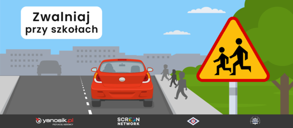 Chodnik po którym chodzą dzieci, czerwony samochód na jezdni pokazany od tyłu, przy ulicy znak drogowy &amp;quot;uwaga dzieci&amp;quot;, napis na plakacie &amp;quot;Zwalniaj przy szkołach&amp;quot;